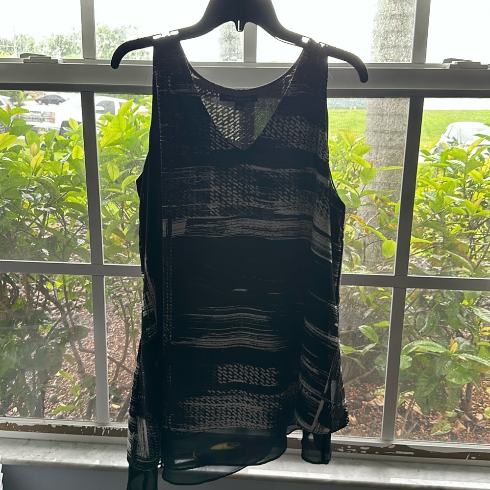 Black and white asymmetrical dress.